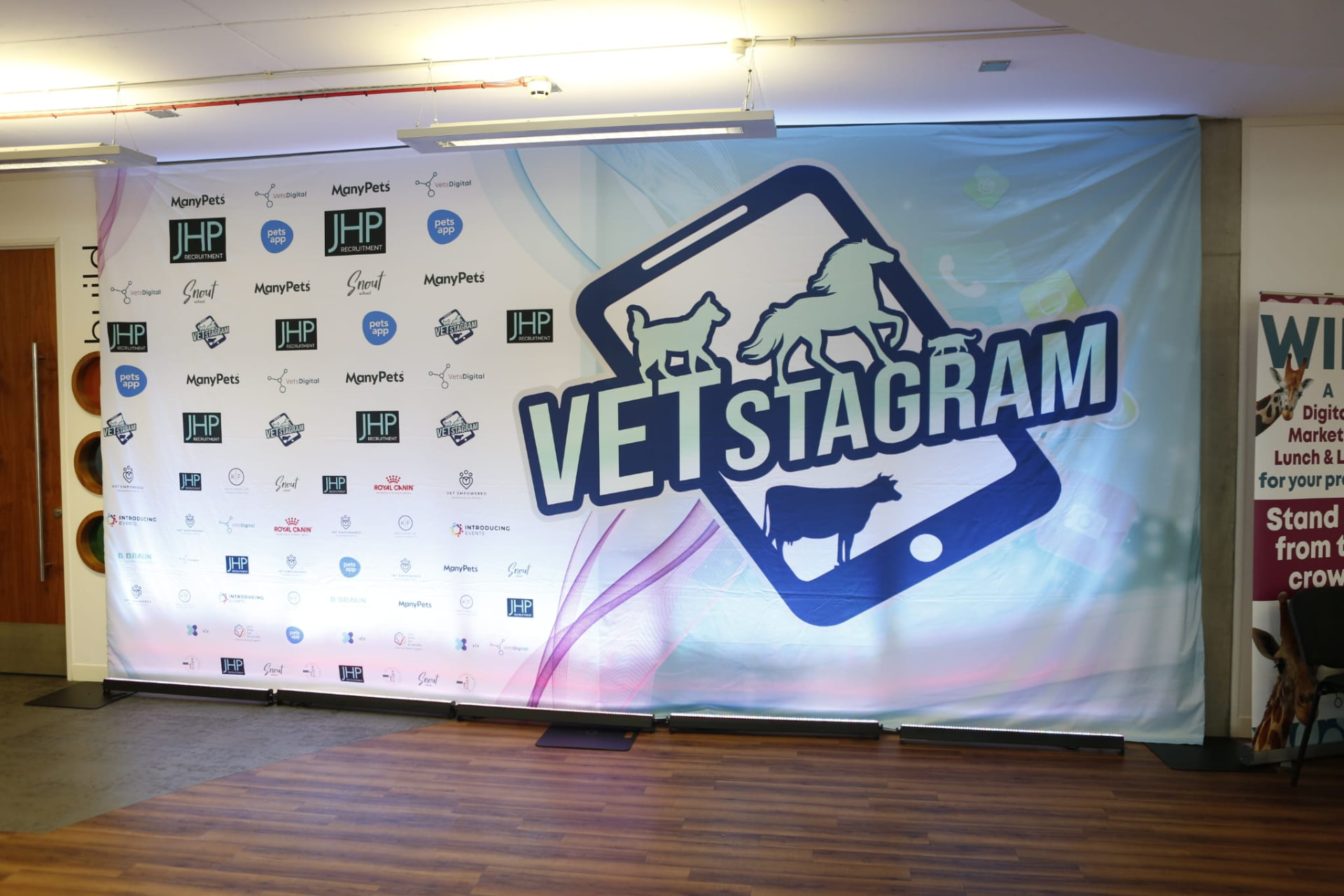 The VETstagram 2023 sponsor media wall in the Manchester venue